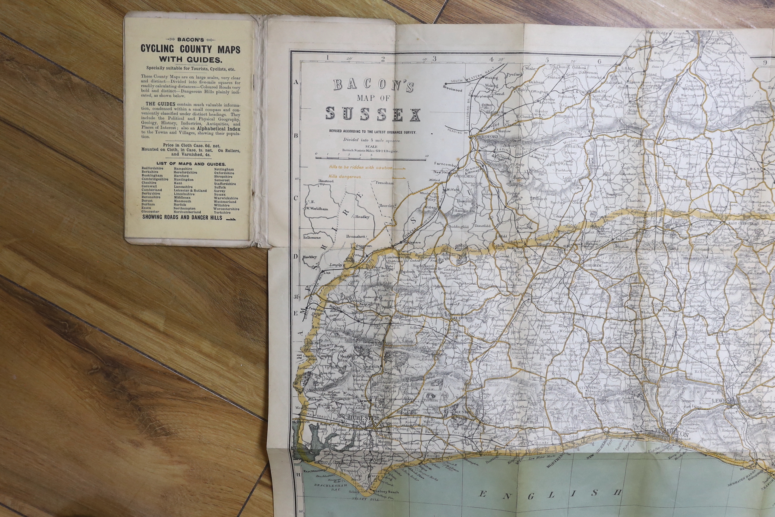 Seven 19th and 20th century folding maps of Sussex; a Pocket County Map series, pub. Chapman and Hall, a Cruchley’s County Map, a Gall & Inglis County Map, a Letts Son & Co. map, a Bacon’s County Map, a Bartholomew’s map